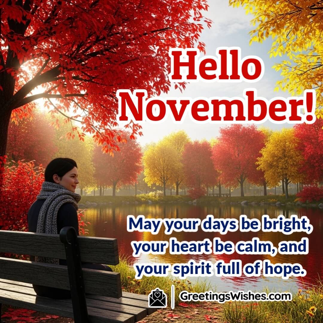 Hello November Bright and Hopeful Morning Wish Image featuring a peaceful autumn park with red and golden trees reflected in a calm lake, symbolizing serenity, balance, and a heart full of hope.