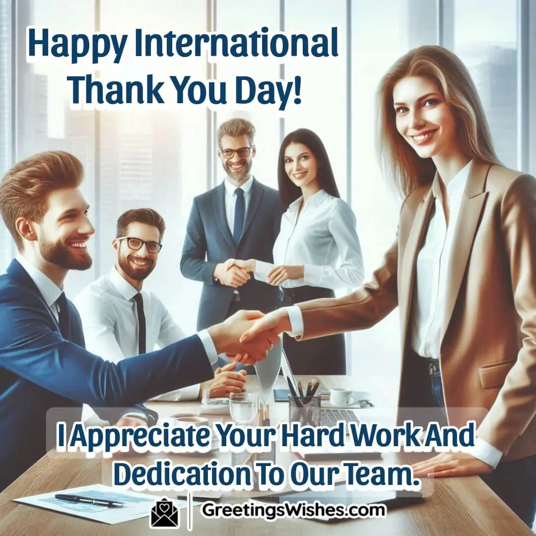 Colleagues shaking hands in an office, with a 'Thank You' banner symbolising teamwork and appreciation.